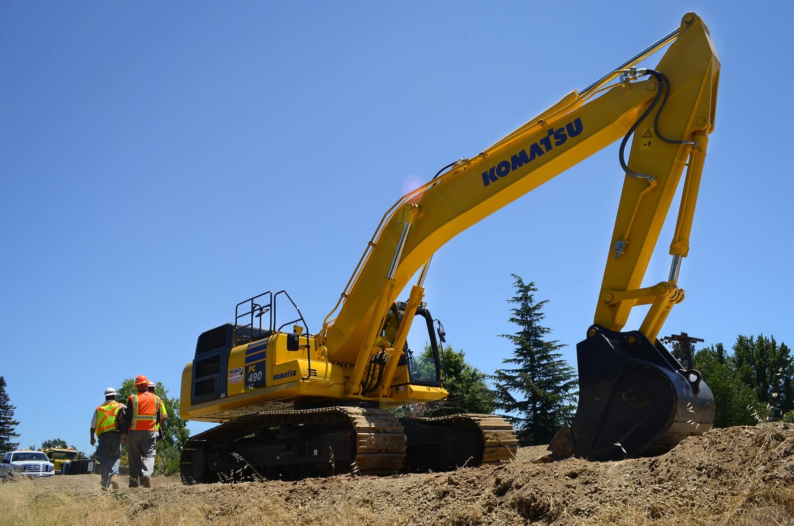 Engineers inspecting a levee construction site